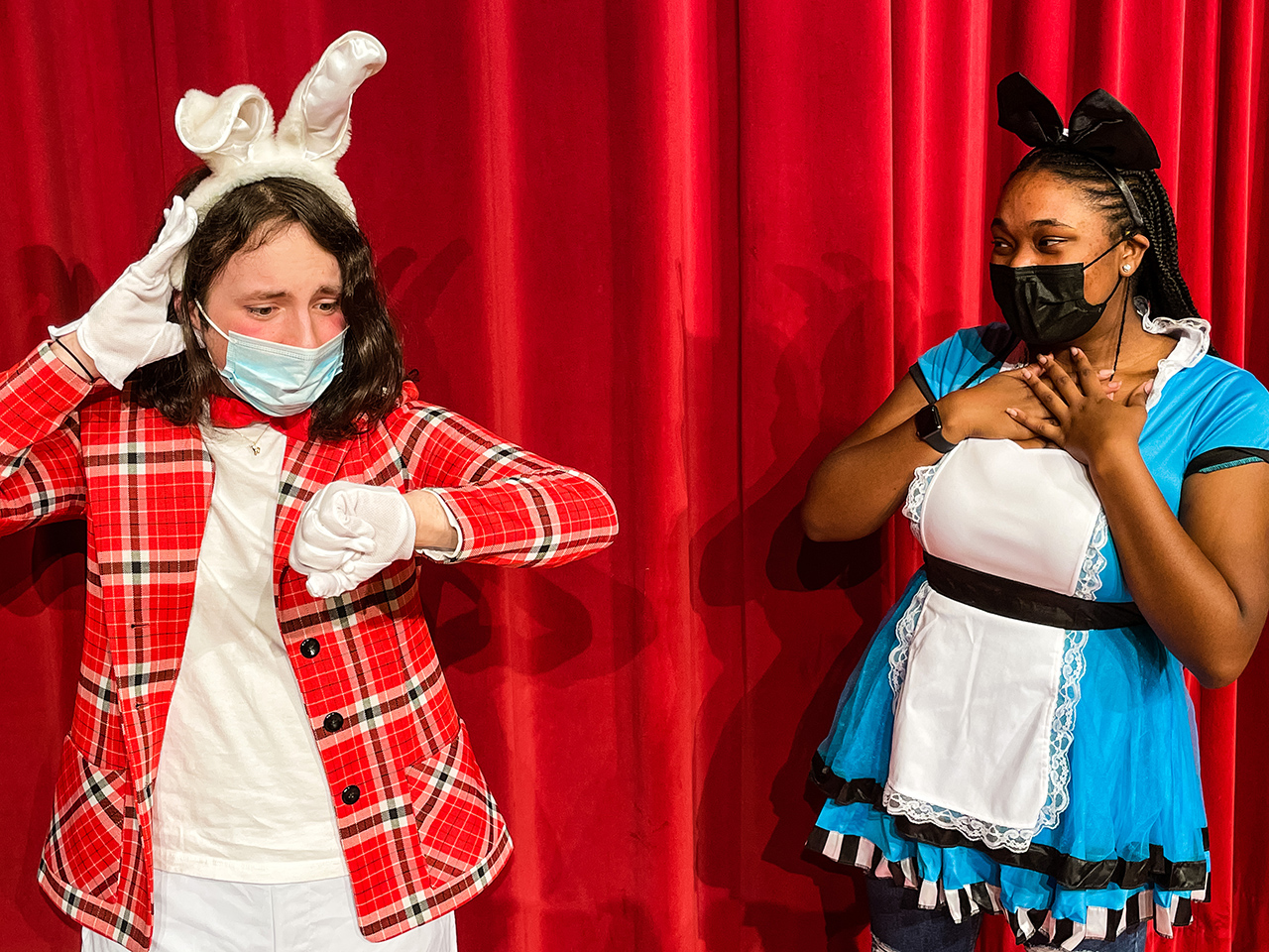 Cai House as the White Rabbit and Charity Archer as Alice